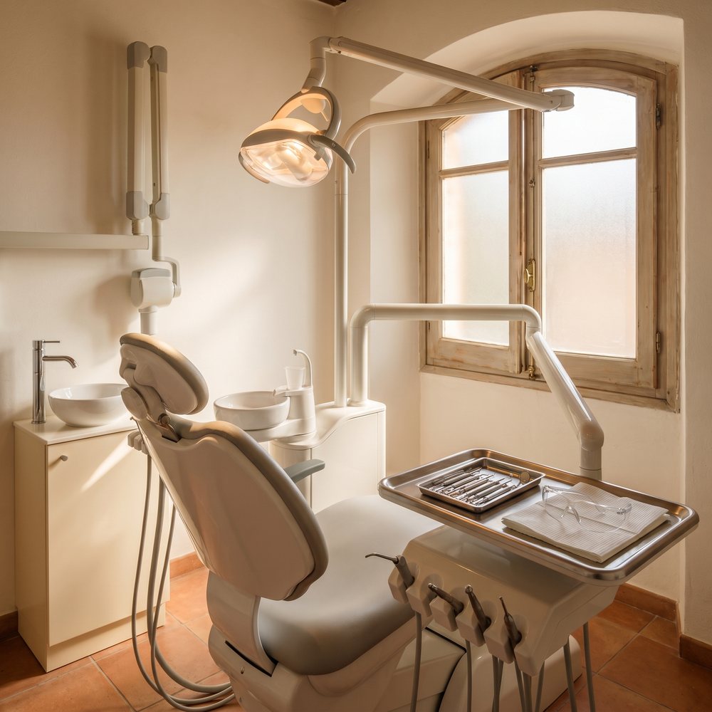 The chair of a small dental practice, a calm atmosphere.